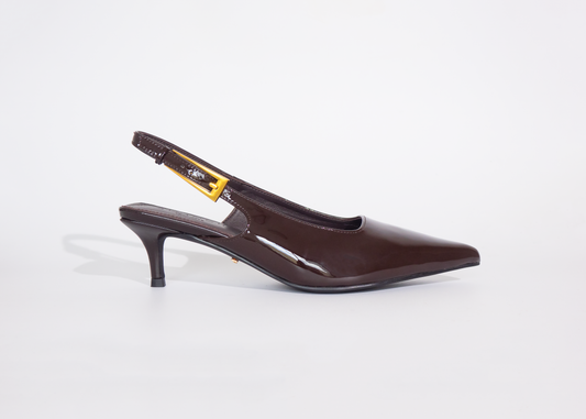 Brown wide fit high-heeled shoe on a white background with kitten heels and gold buckle strap